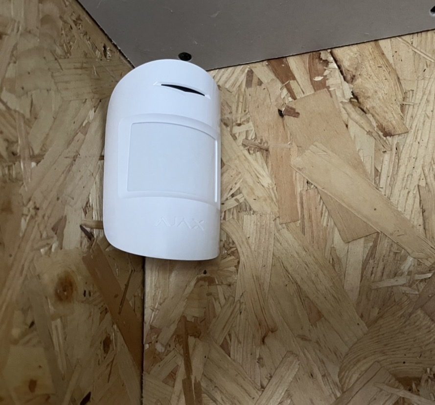 AJAX motion sensor installed on internal wall for intruder alarm system